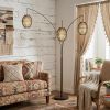 82" Bronze Three Light Tree Floor Lamp With Beige Wicker Cage Shade