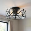 Black Unique Statement Four Light Metal Dimmable Flush Chandelier With Clear Shades