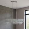 Silver And Clear Twelve Light Metal Dimmable Chandelier With Clear Shades