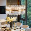 Gold Twelve Light Metal Chandelier With Gold Shades
