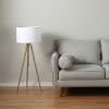 Gold Metal Adjustable Tripod Floor Lamp With White Linen Drum Shade